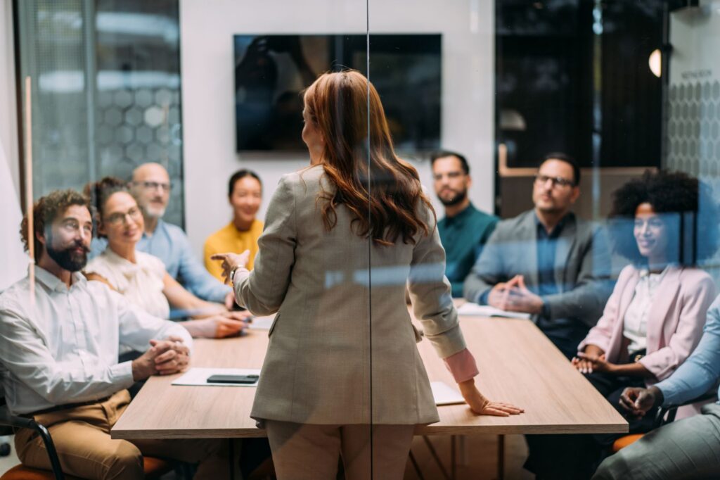 A depiction of a woman delivering a presentation following the 2026 autumn Budget