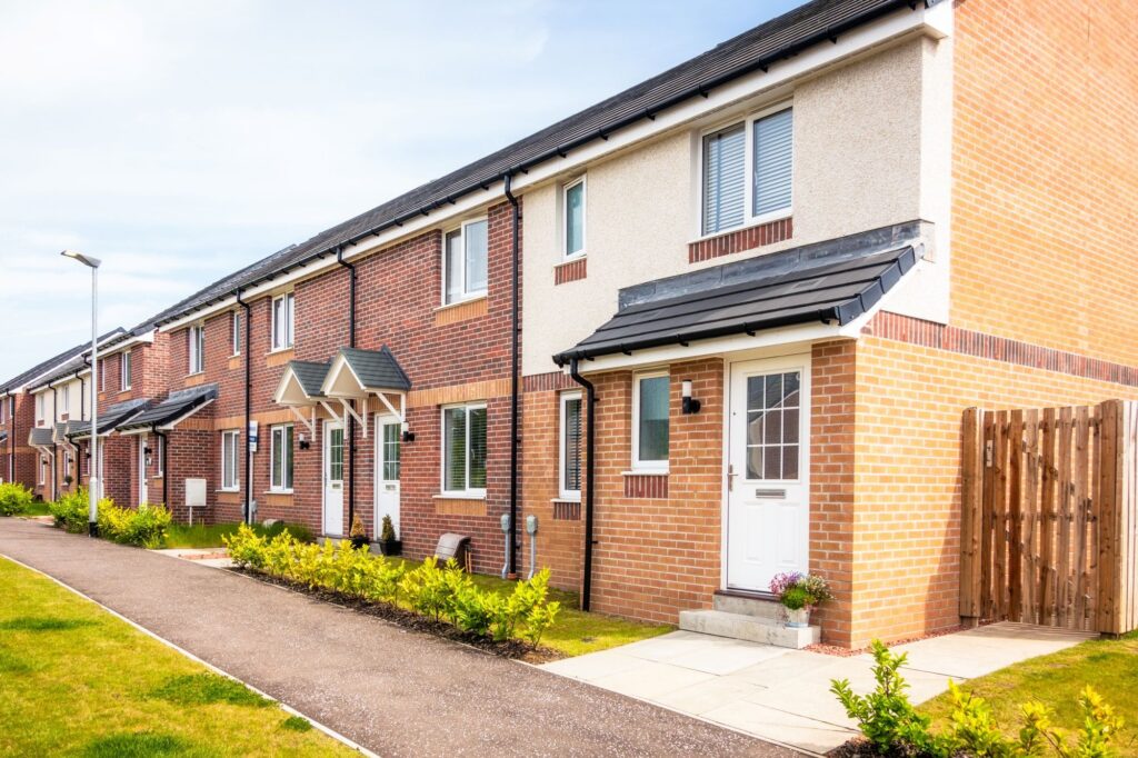 A row of new-build terraced houses for first-time buyers.
