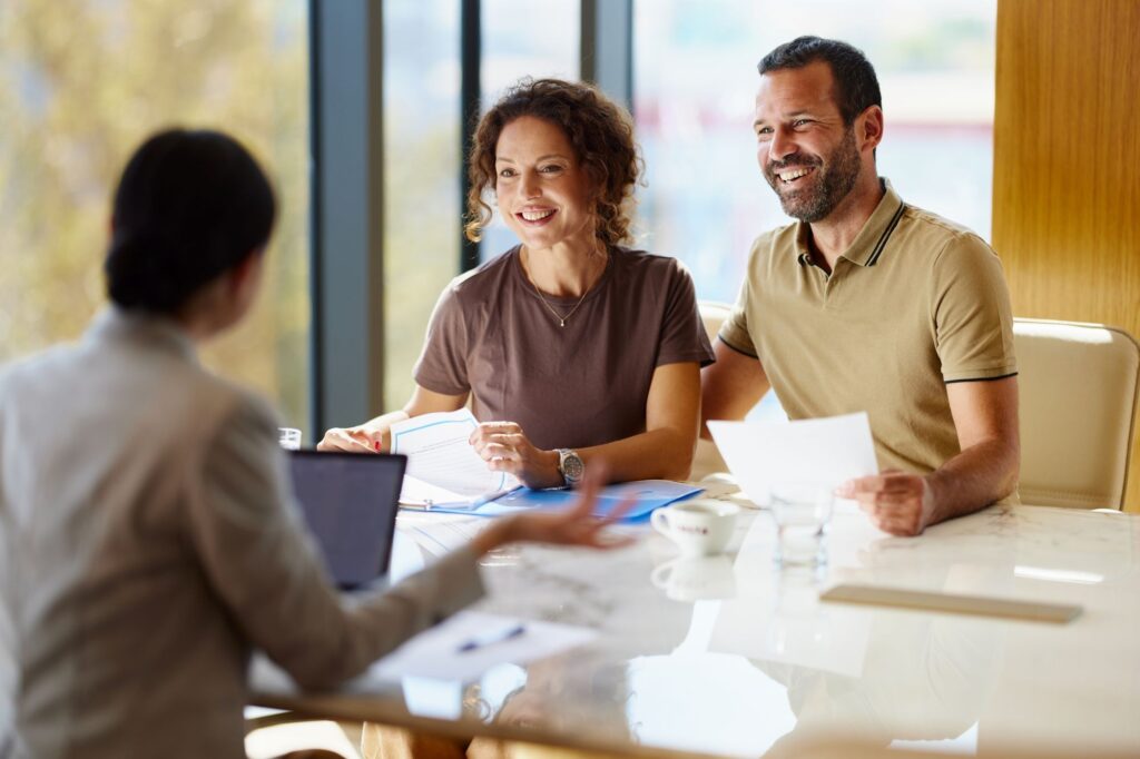 A client meeting with an accountant and two clients depicting follow up from the Income tax and self-assessment changes from the 2026 autumn budget